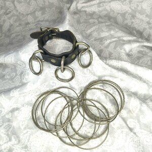 Vintage adjustable leather bondage 3 ring cuff with several metal bracelets